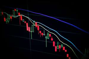 Forex and cryptocurrency trading comparison charts on digital screens showing market differences